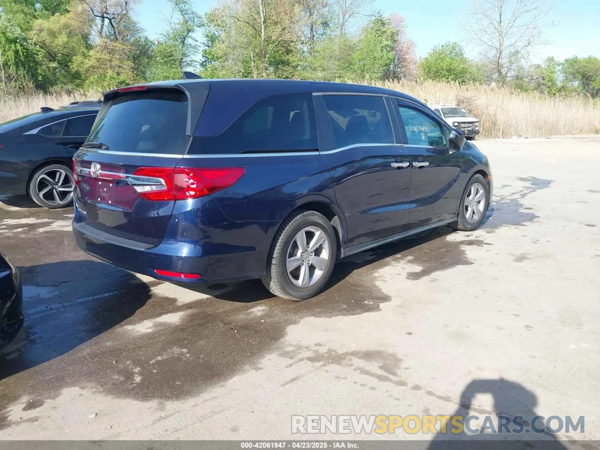 4 Photograph of a damaged car 5FNRL6H71KB004694 HONDA ODYSSEY 2019