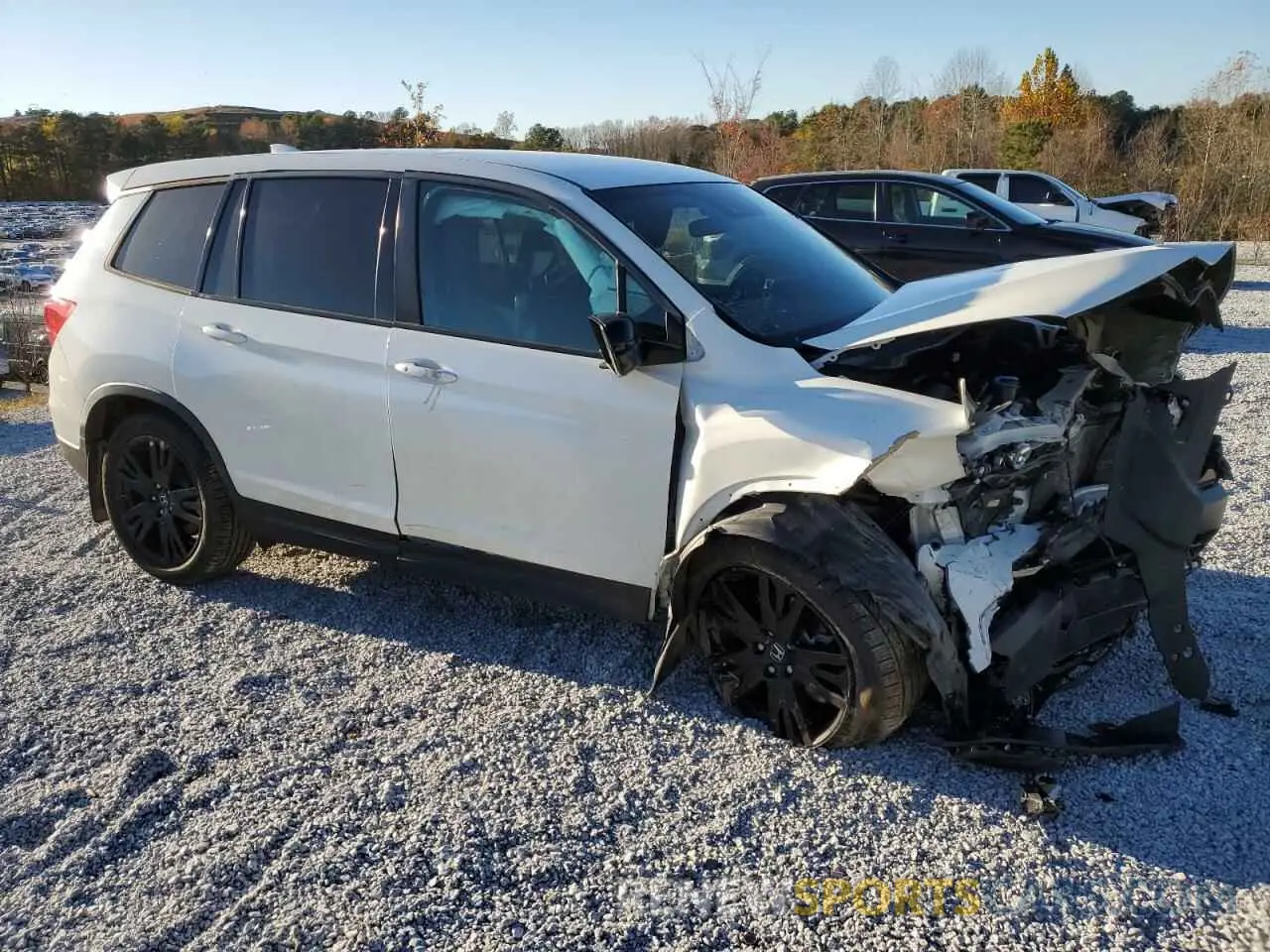 4 Photograph of a damaged car 5FNYF7H20KB004246 HONDA PASSPORT 2019