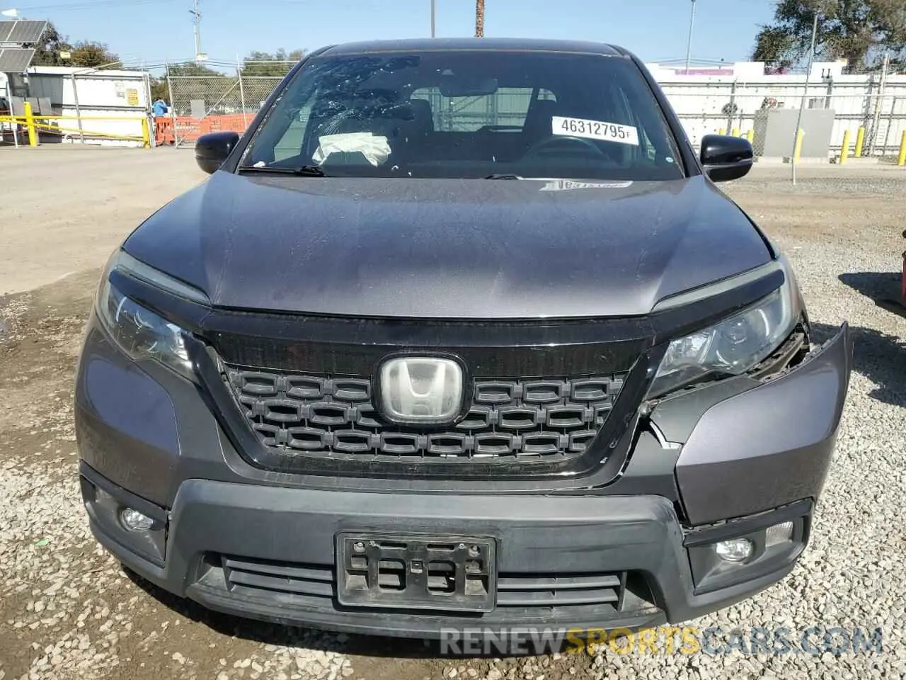 5 Photograph of a damaged car 5FNYF7H58KB003906 HONDA PASSPORT 2019