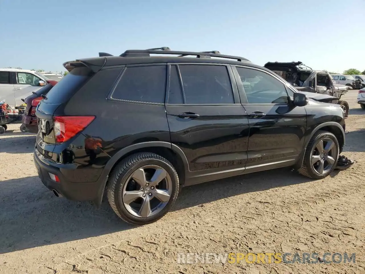 3 Photograph of a damaged car 5FNYF7H94KB002027 HONDA PASSPORT 2019