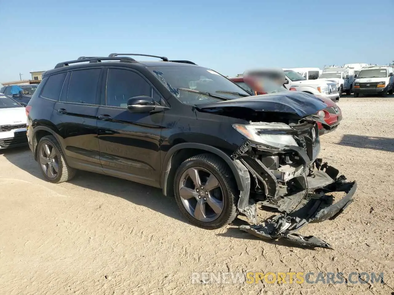 4 Photograph of a damaged car 5FNYF7H94KB002027 HONDA PASSPORT 2019