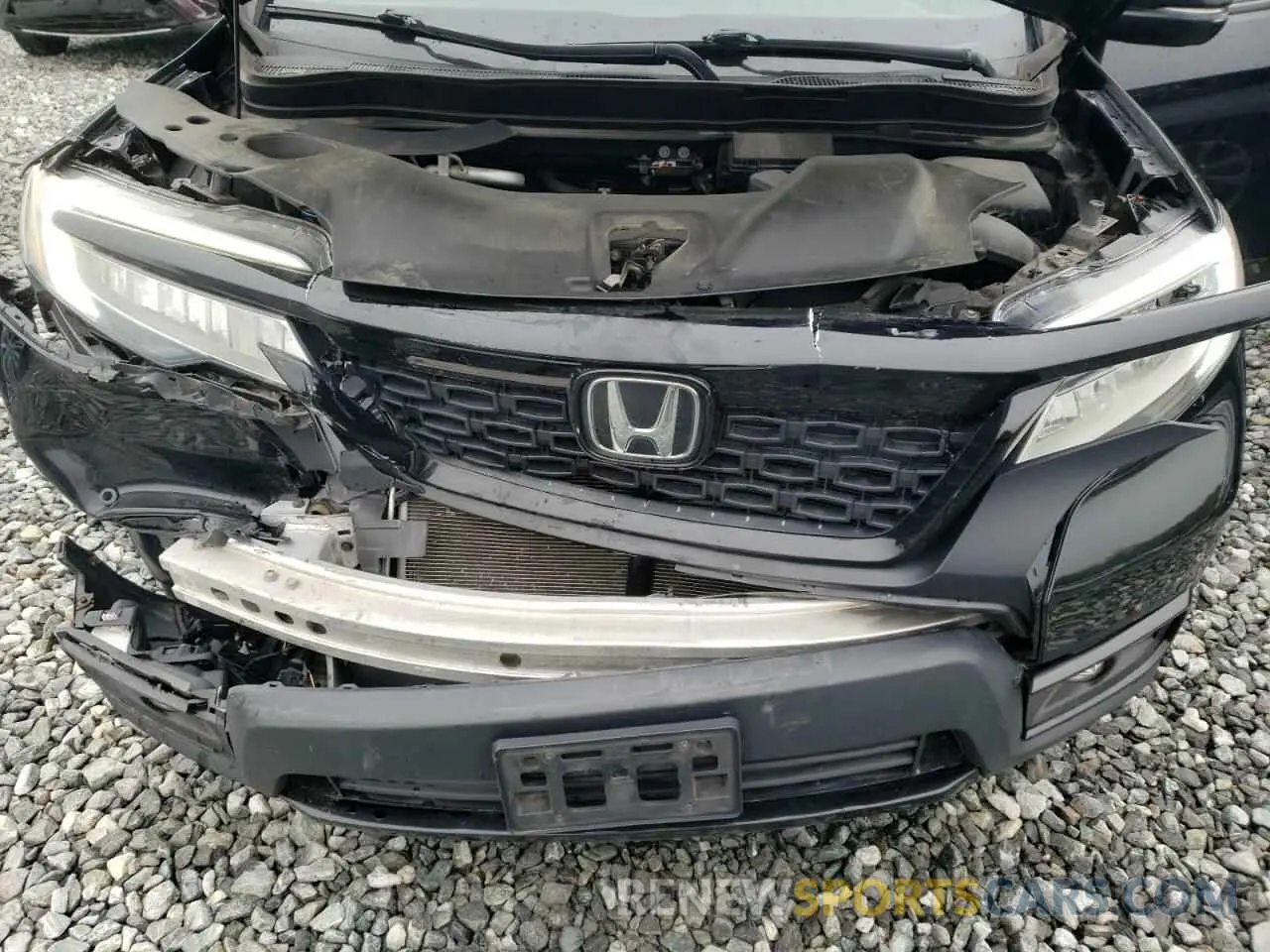 12 Photograph of a damaged car 5FNYF8H0XKB008356 HONDA PASSPORT 2019