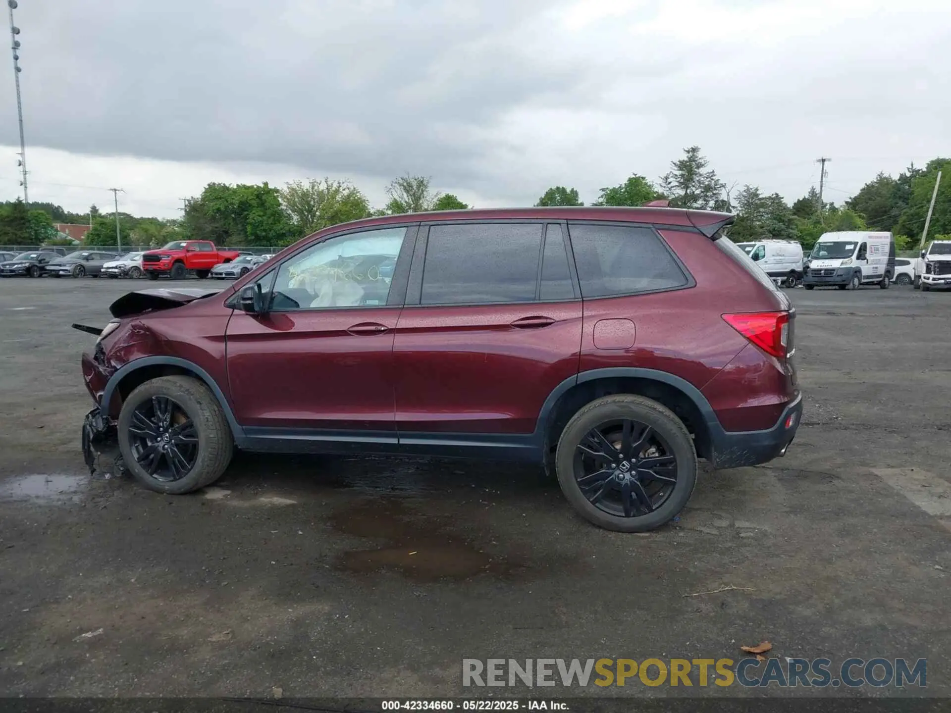 14 Photograph of a damaged car 5FNYF8H21KB010014 HONDA PASSPORT 2019