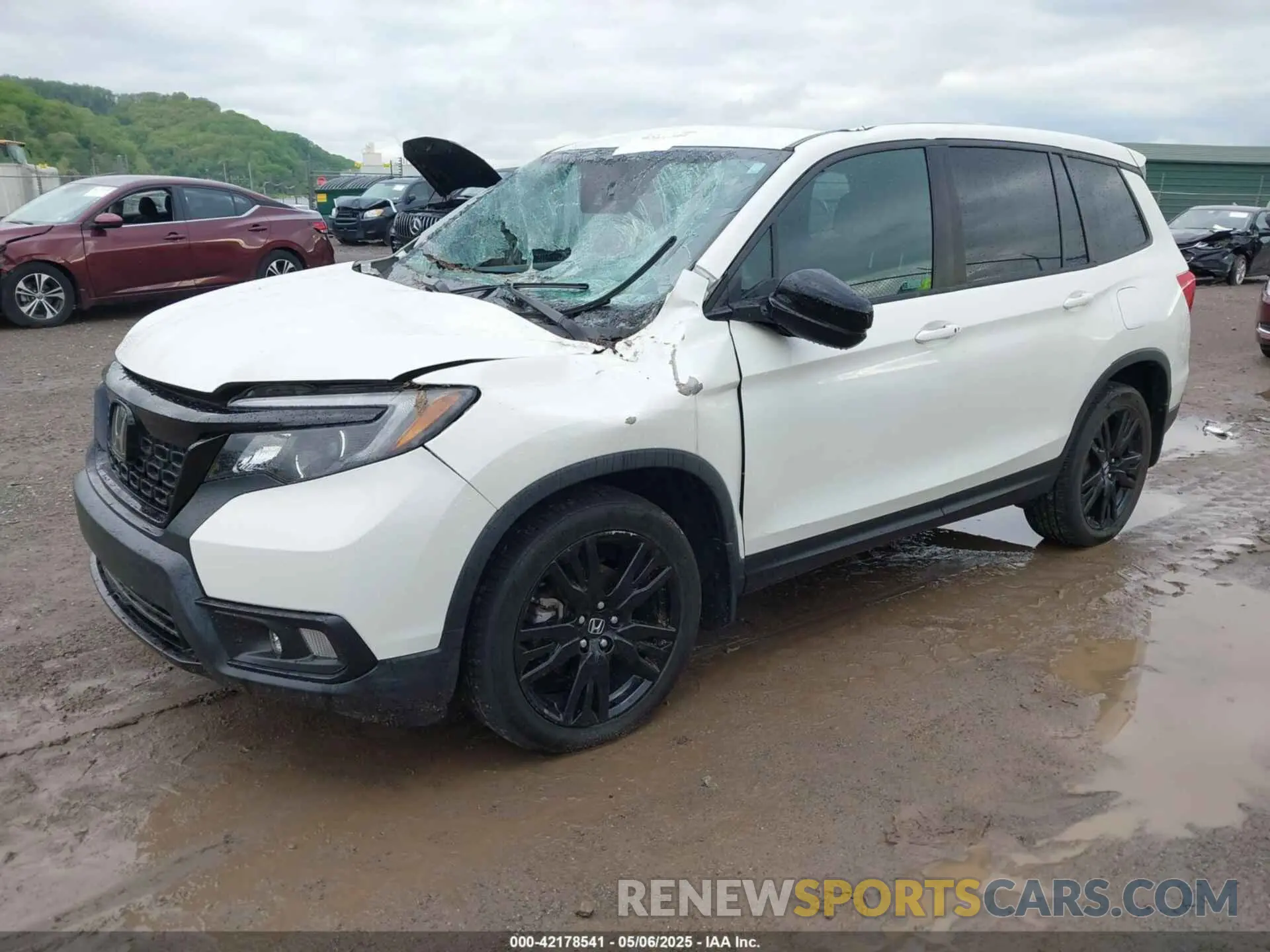 2 Photograph of a damaged car 5FNYF8H28KB010303 HONDA PASSPORT 2019