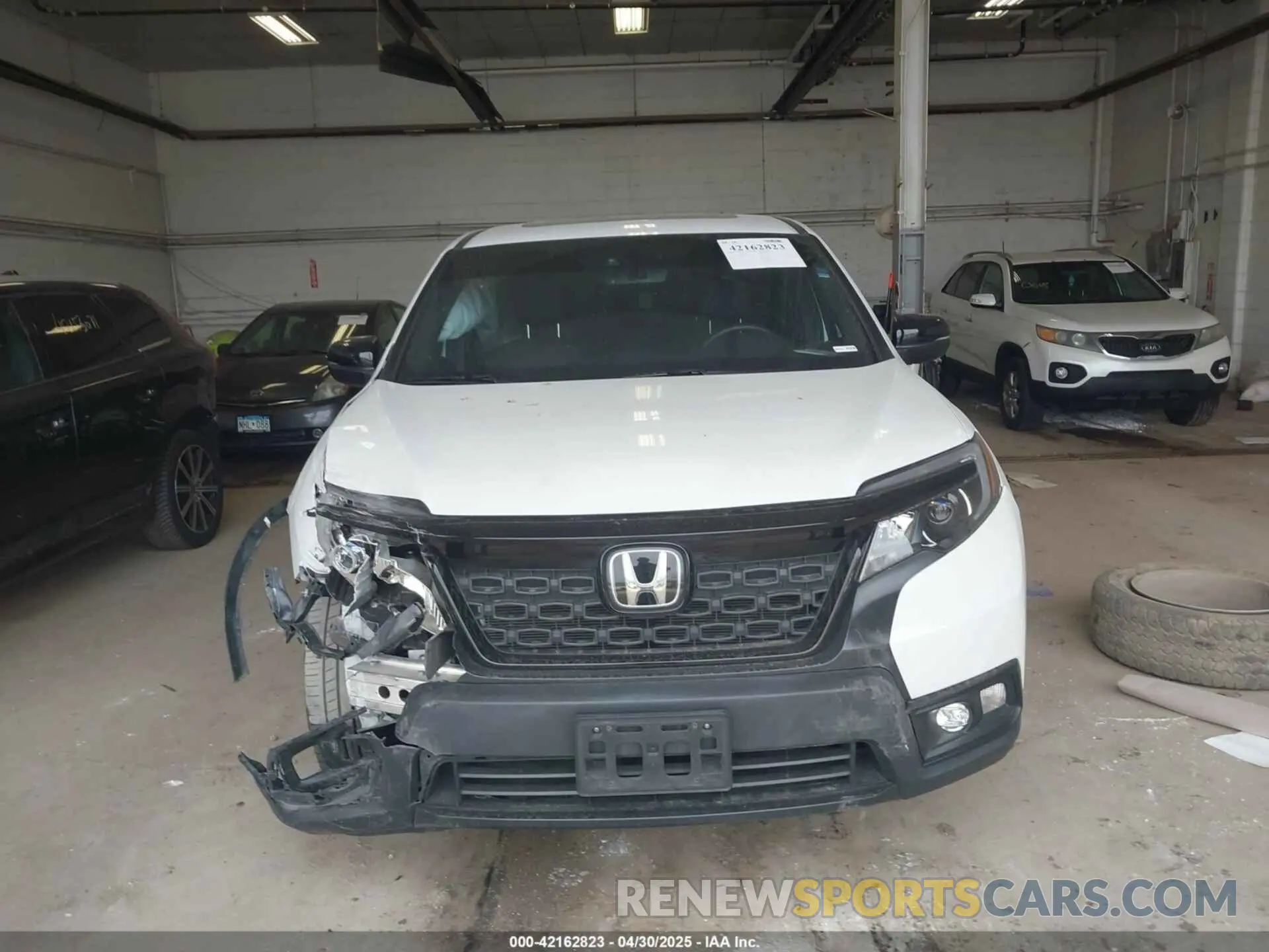 12 Photograph of a damaged car 5FNYF8H51KB028703 HONDA PASSPORT 2019