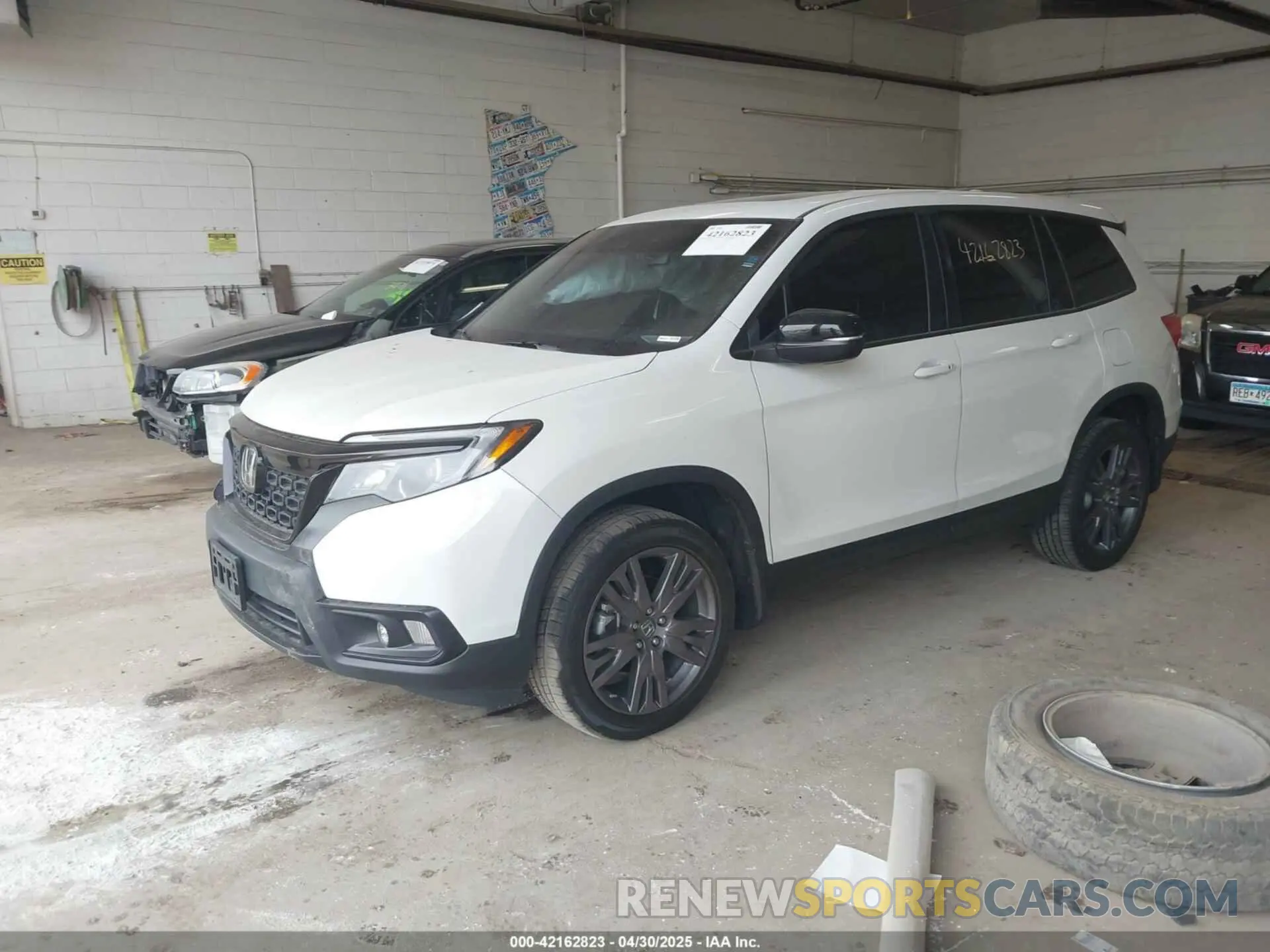 2 Photograph of a damaged car 5FNYF8H51KB028703 HONDA PASSPORT 2019