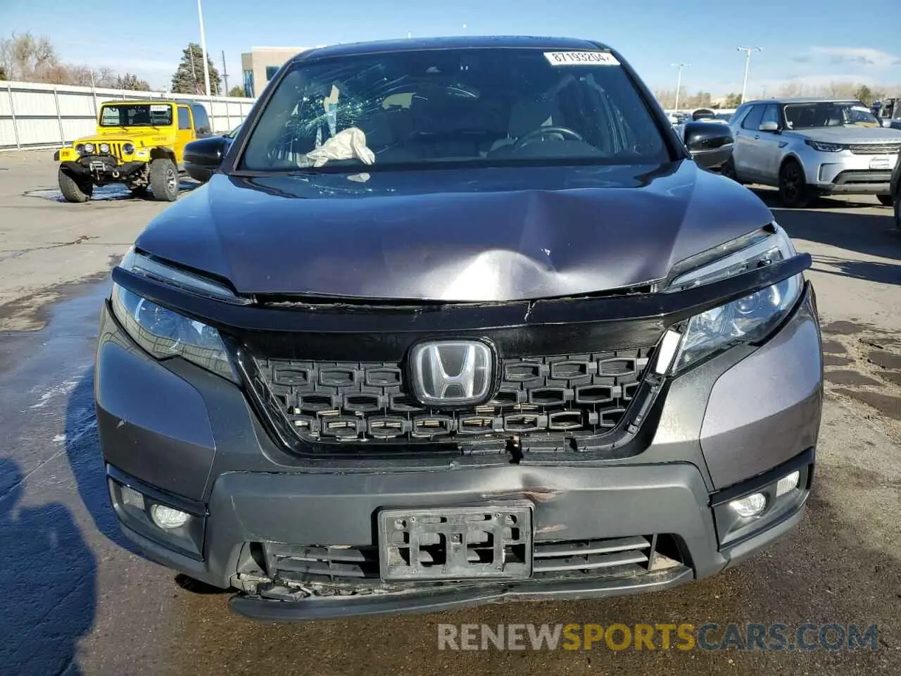 5 Photograph of a damaged car 5FNYF8H53KB027391 HONDA PASSPORT 2019