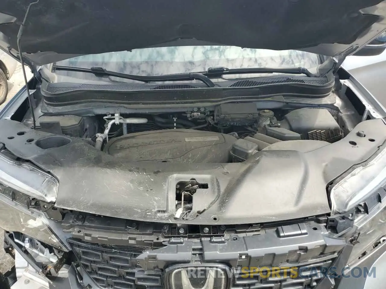 12 Photograph of a damaged car 5FNYF8H5XKB019773 HONDA PASSPORT 2019