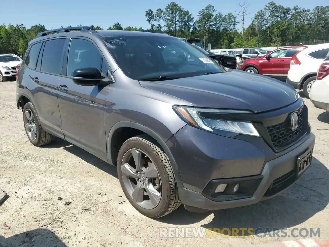 4 Photograph of a damaged car 5FNYF8H93KB007922 HONDA PASSPORT 2019