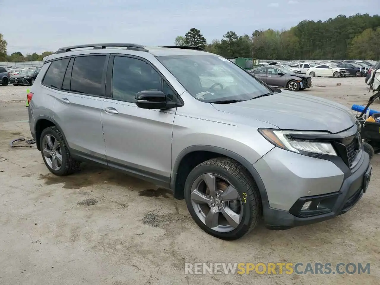 4 Photograph of a damaged car 5FNYF8H93KB009427 HONDA PASSPORT 2019