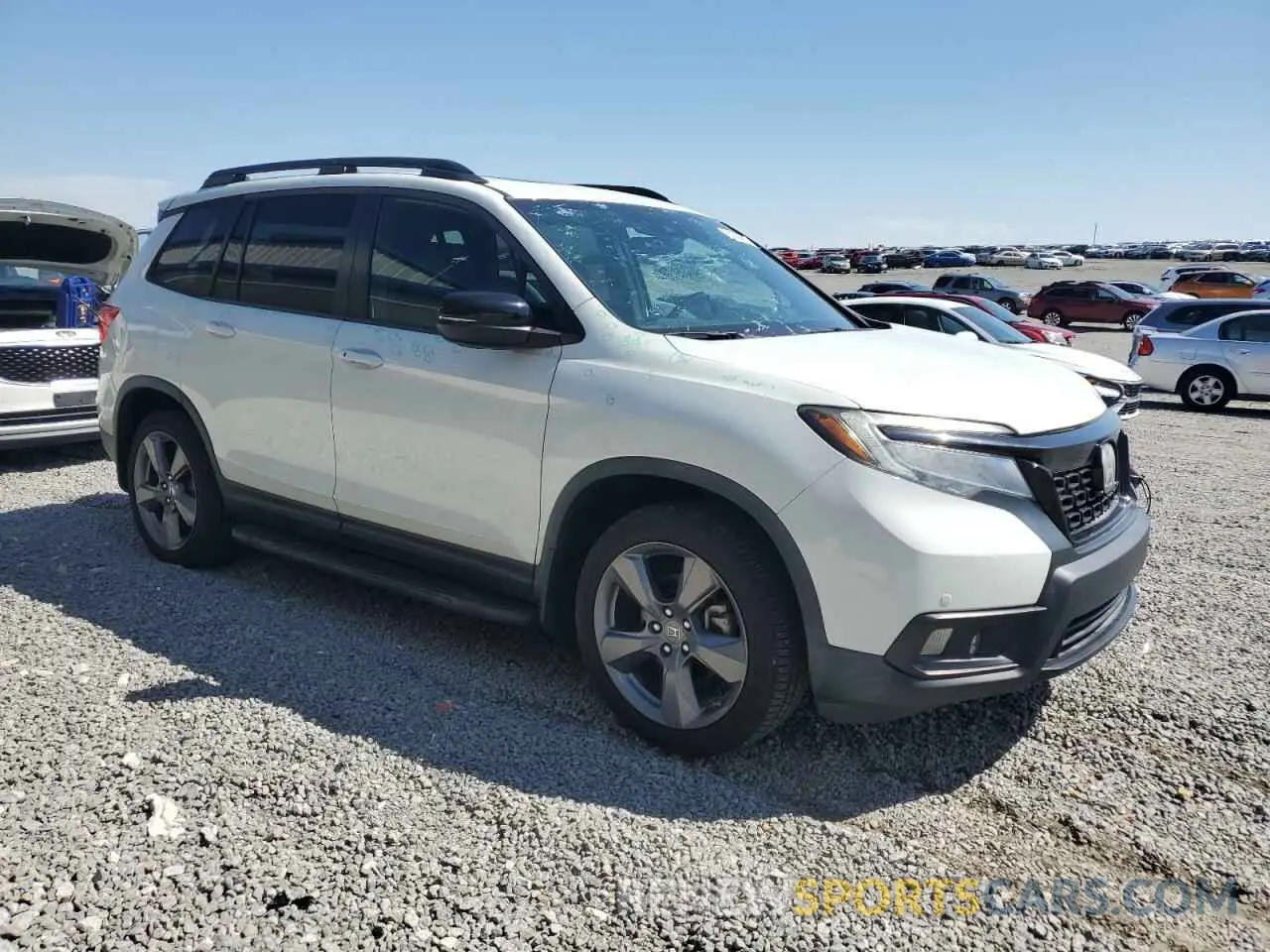 4 Photograph of a damaged car 5FNYF8H95KB023801 HONDA PASSPORT 2019