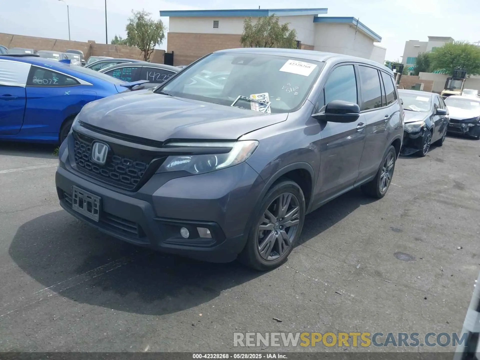 2 Photograph of a damaged car 5FNYF7H50LB005909 HONDA PASSPORT 2020