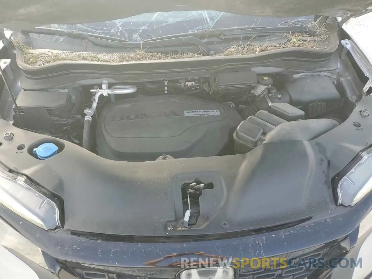 12 Photograph of a damaged car 5FNYF7H51LB000802 HONDA PASSPORT 2020