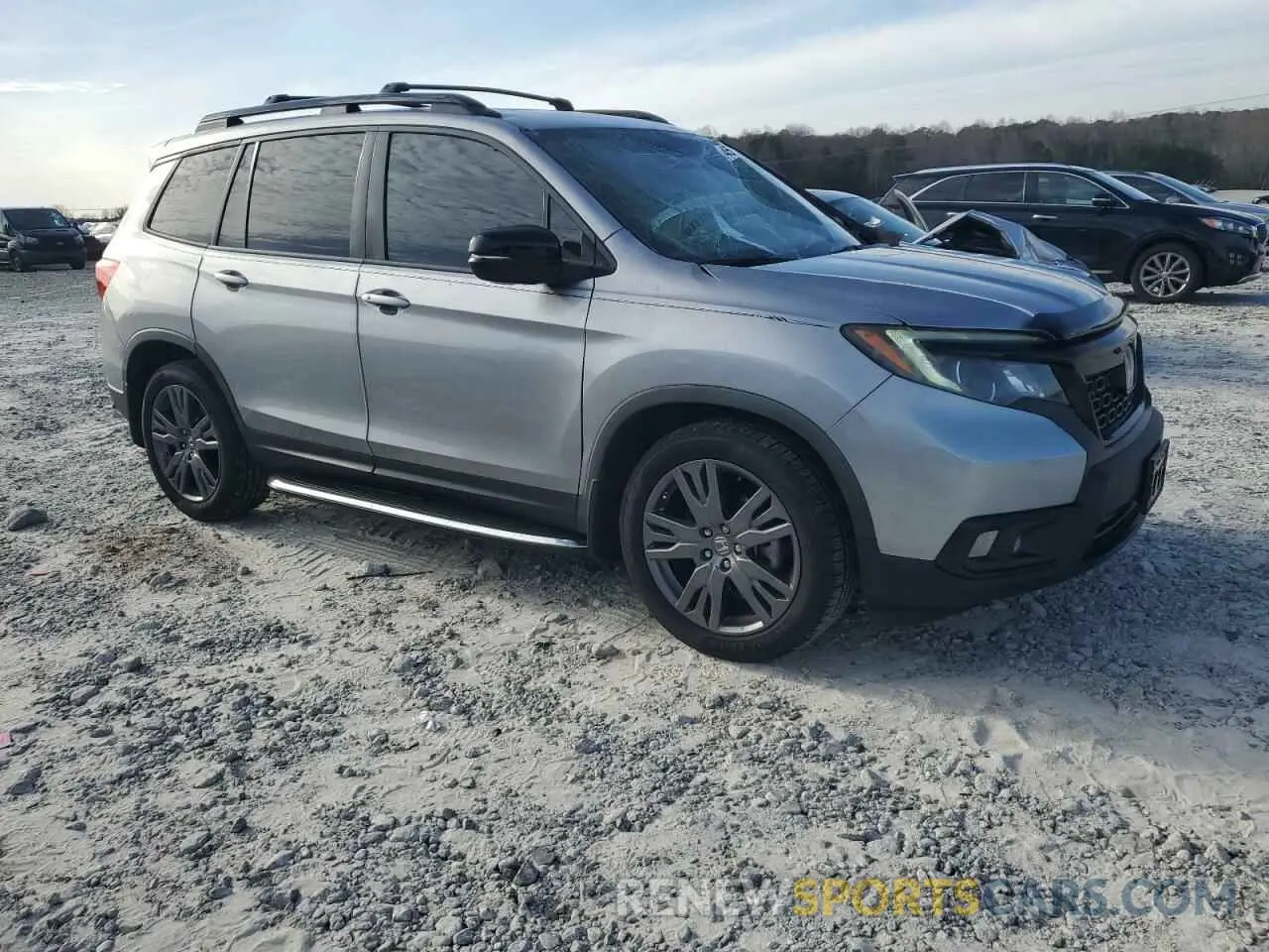 4 Photograph of a damaged car 5FNYF7H51LB000802 HONDA PASSPORT 2020