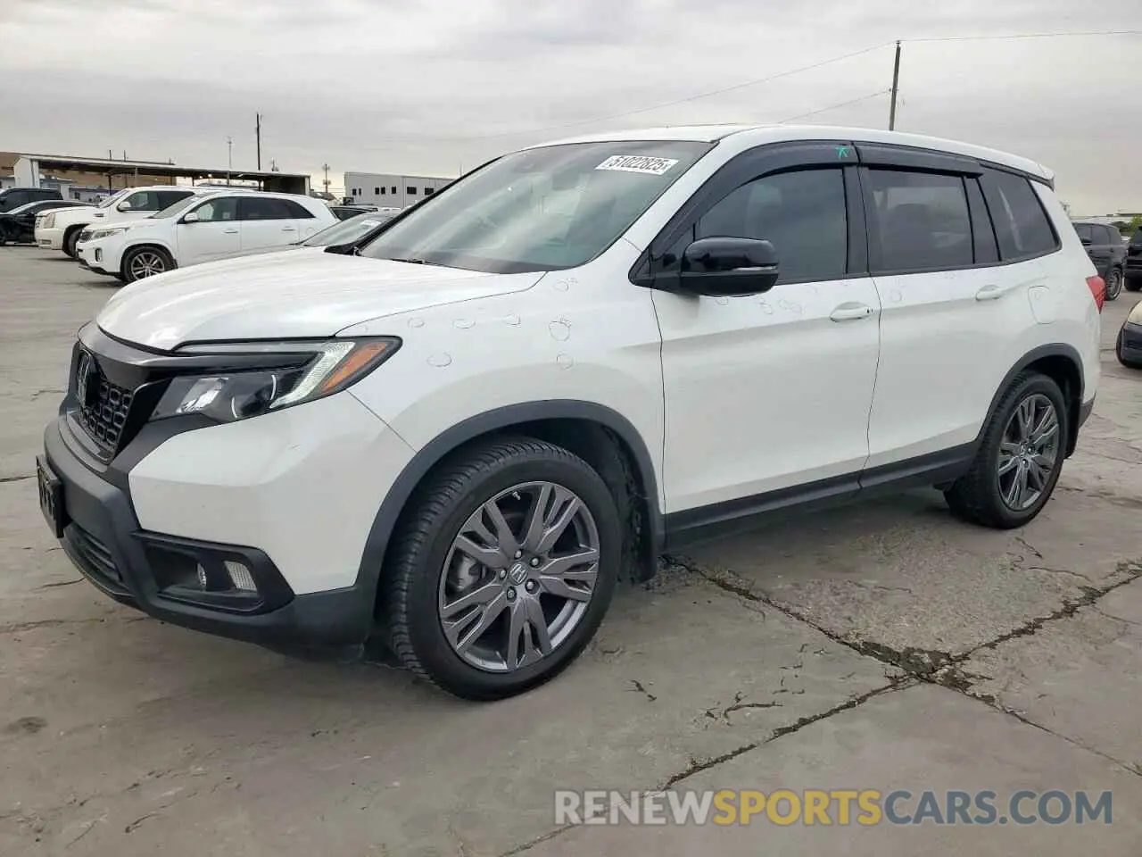 1 Photograph of a damaged car 5FNYF7H57LB002957 HONDA PASSPORT 2020