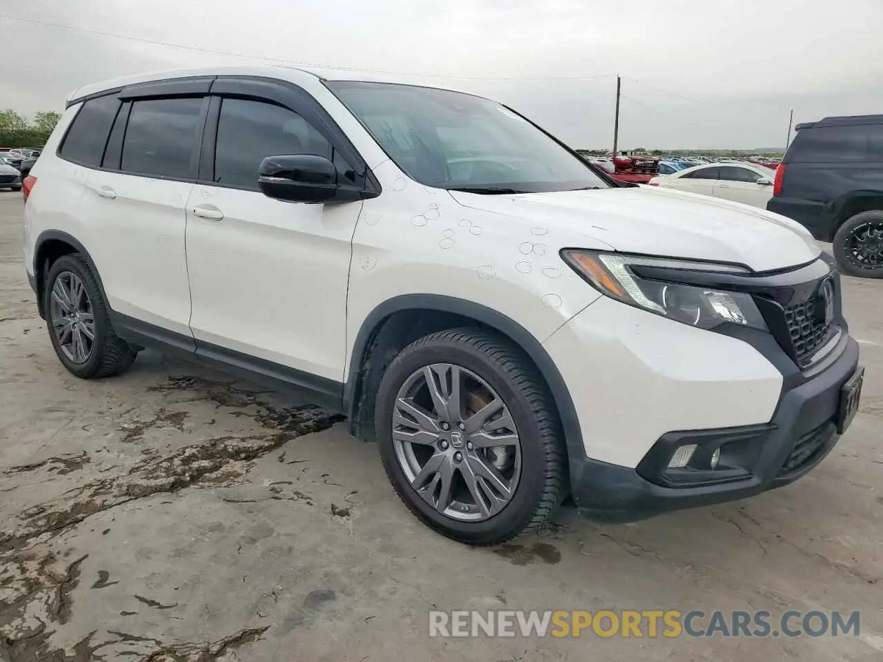 4 Photograph of a damaged car 5FNYF7H57LB002957 HONDA PASSPORT 2020
