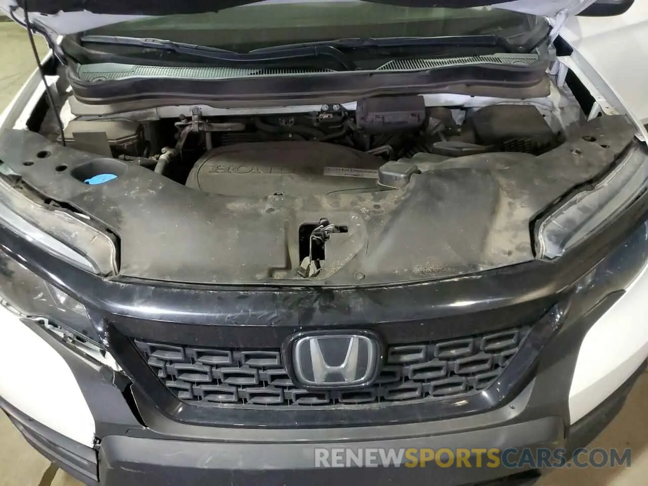 12 Photograph of a damaged car 5FNYF7H58LB003115 HONDA PASSPORT 2020
