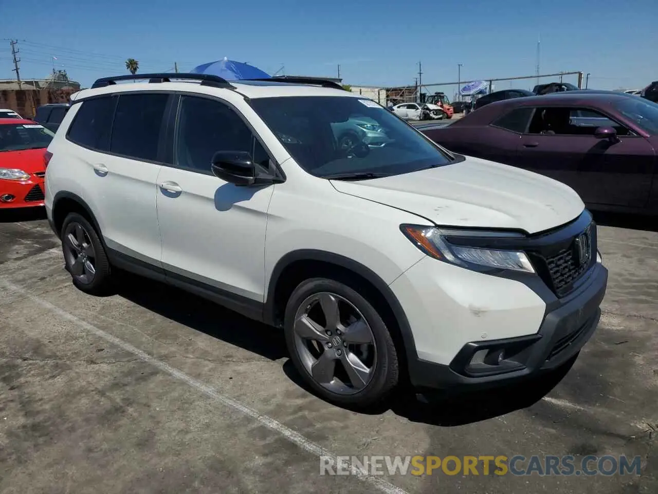 4 Photograph of a damaged car 5FNYF7H94LB005141 HONDA PASSPORT 2020