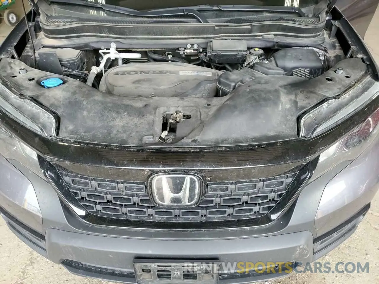 12 Photograph of a damaged car 5FNYF8H50LB000022 HONDA PASSPORT 2020