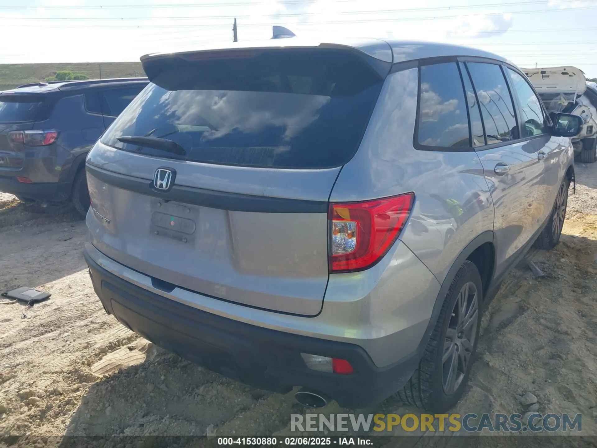 4 Photograph of a damaged car 5FNYF7H50MB011436 HONDA PASSPORT 2021