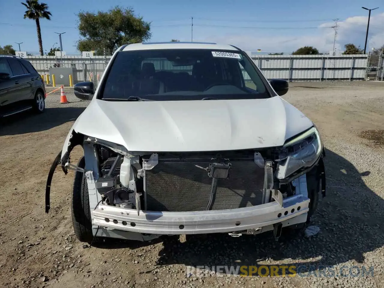 5 Photograph of a damaged car 5FNYF7H50MB014143 HONDA PASSPORT 2021