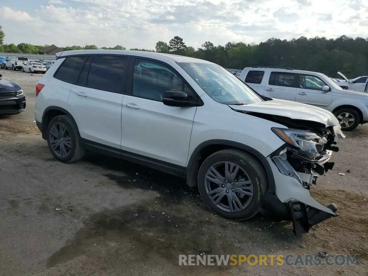 4 Photograph of a damaged car 5FNYF7H52MB005038 HONDA PASSPORT 2021