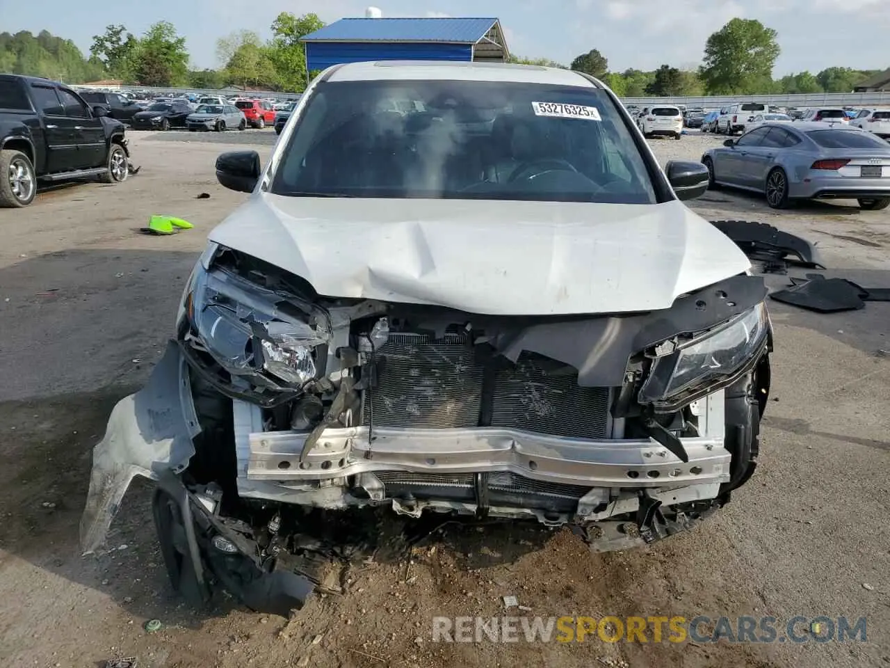 5 Photograph of a damaged car 5FNYF7H52MB005038 HONDA PASSPORT 2021