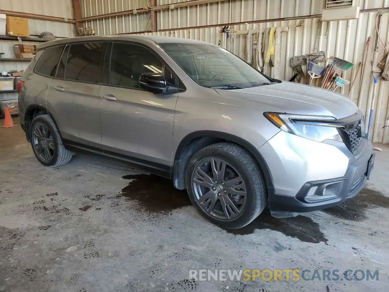 4 Photograph of a damaged car 5FNYF7H54MB008281 HONDA PASSPORT 2021