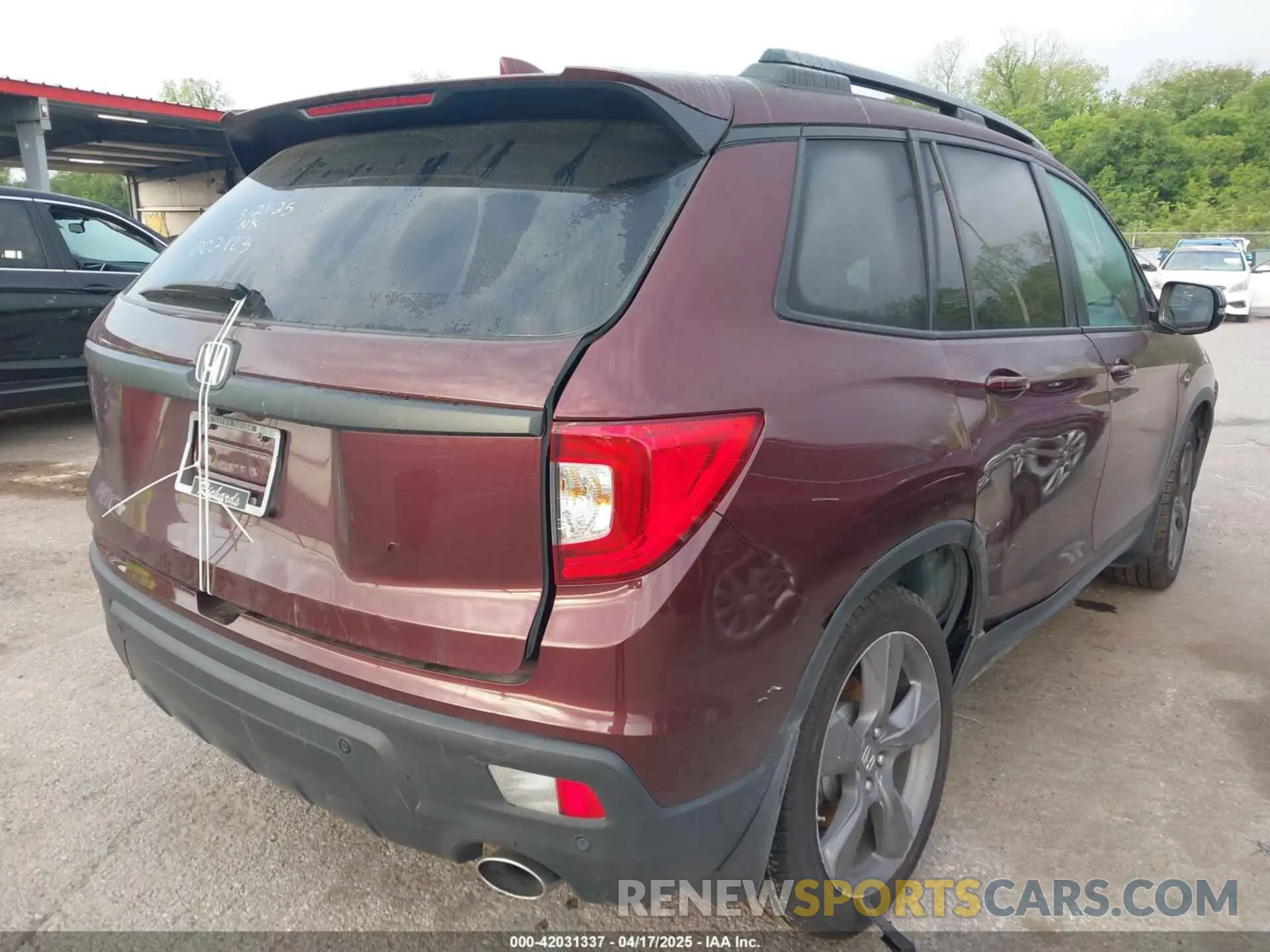 4 Photograph of a damaged car 5FNYF7H97MB002123 HONDA PASSPORT 2021