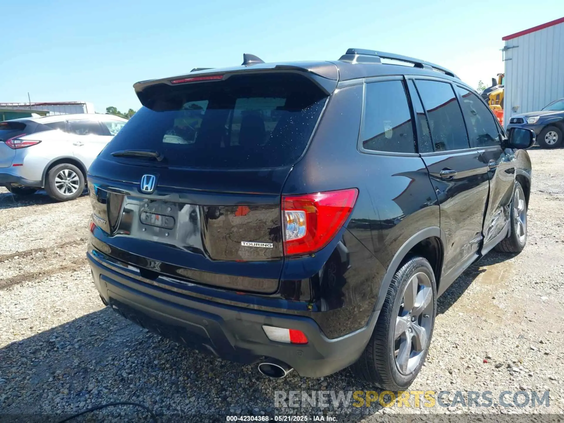 4 Photograph of a damaged car 5FNYF7H98MB007542 HONDA PASSPORT 2021