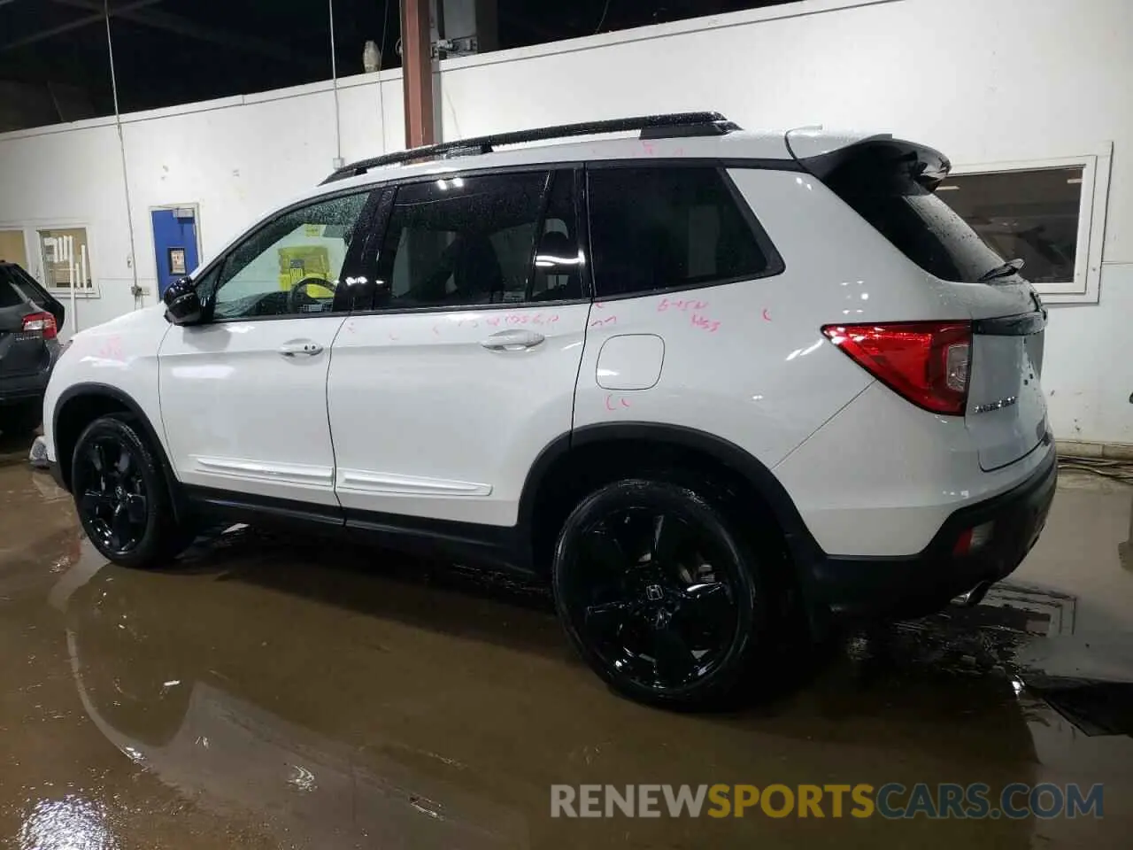 2 Photograph of a damaged car 5FNYF8H00MB000298 HONDA PASSPORT 2021
