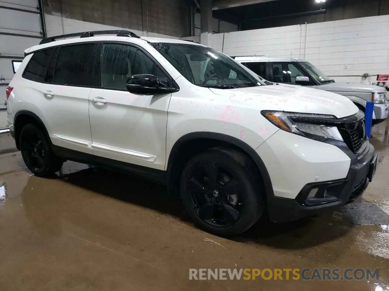 4 Photograph of a damaged car 5FNYF8H00MB000298 HONDA PASSPORT 2021
