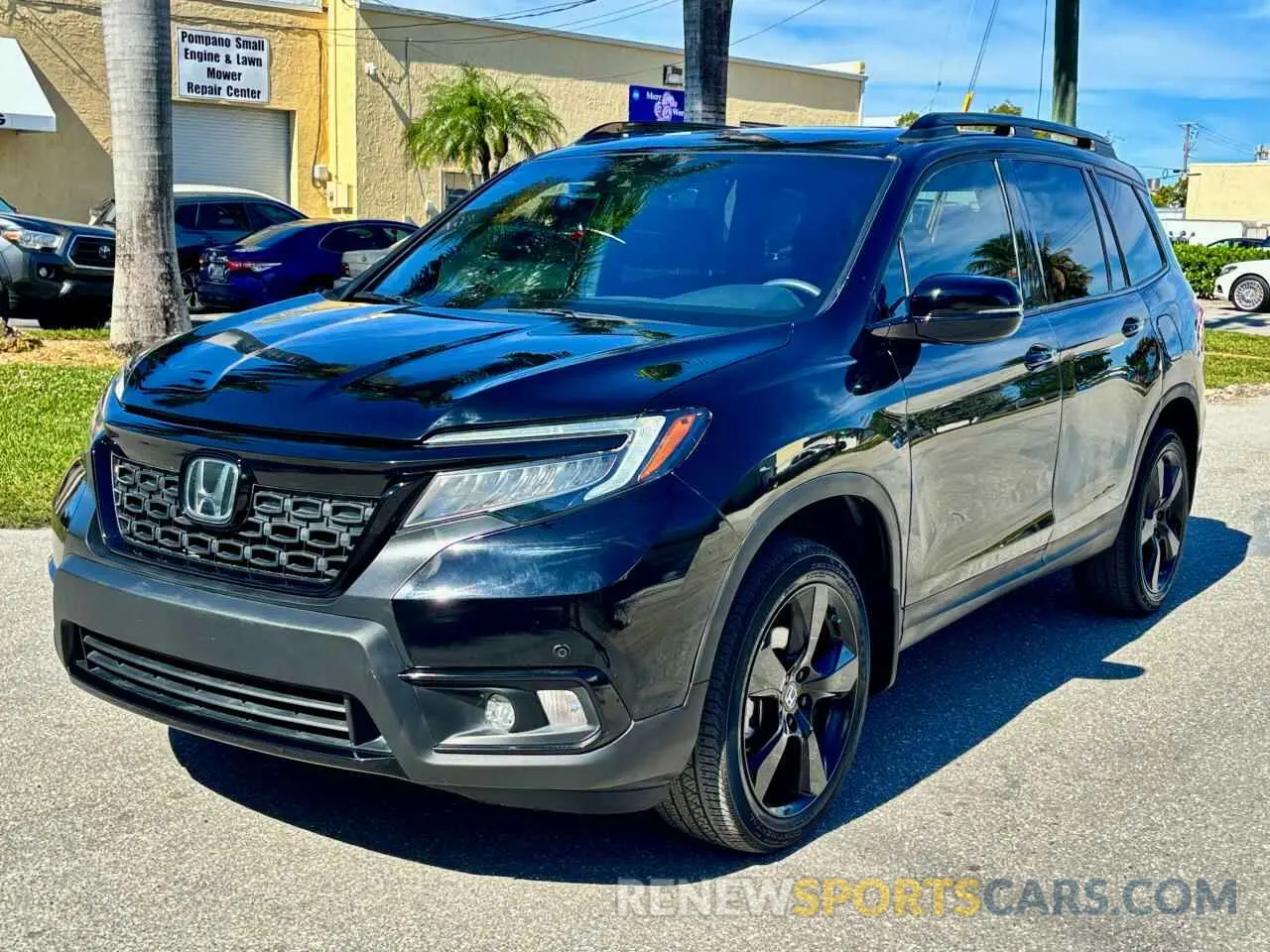 2 Photograph of a damaged car 5FNYF8H01MB013559 HONDA PASSPORT 2021