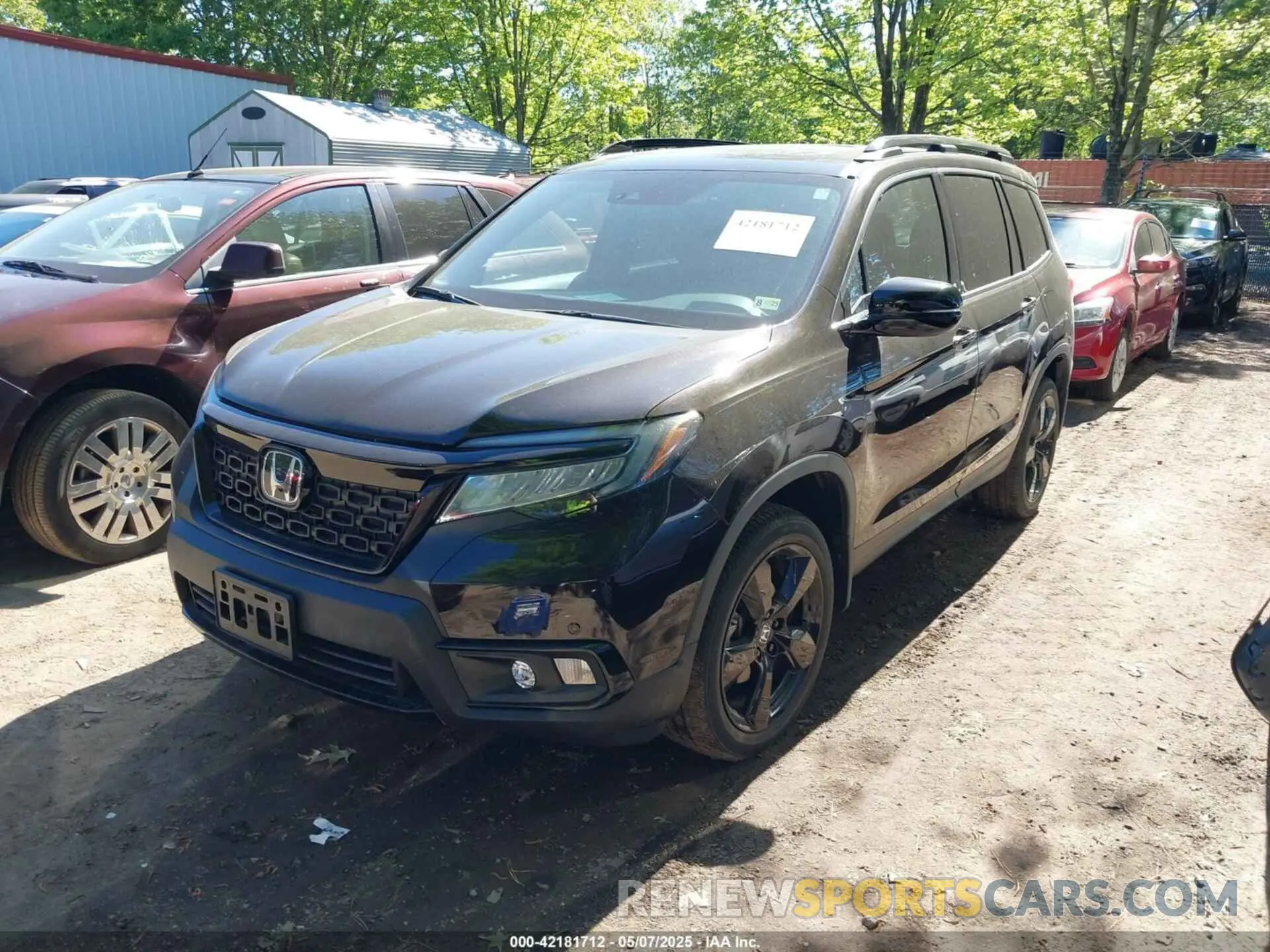 2 Photograph of a damaged car 5FNYF8H03MB026880 HONDA PASSPORT 2021