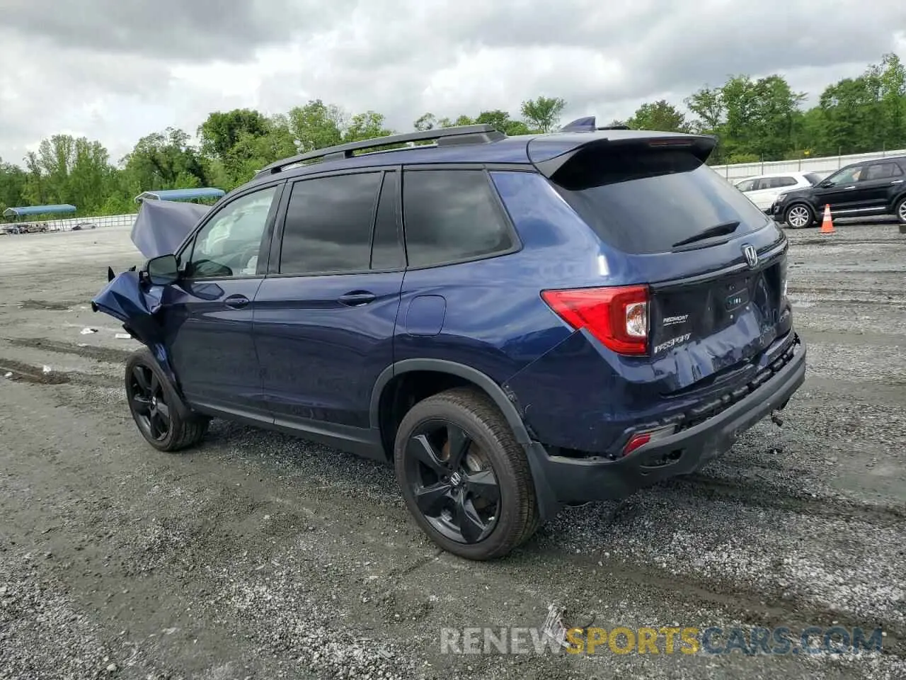 2 Photograph of a damaged car 5FNYF8H04MB023356 HONDA PASSPORT 2021