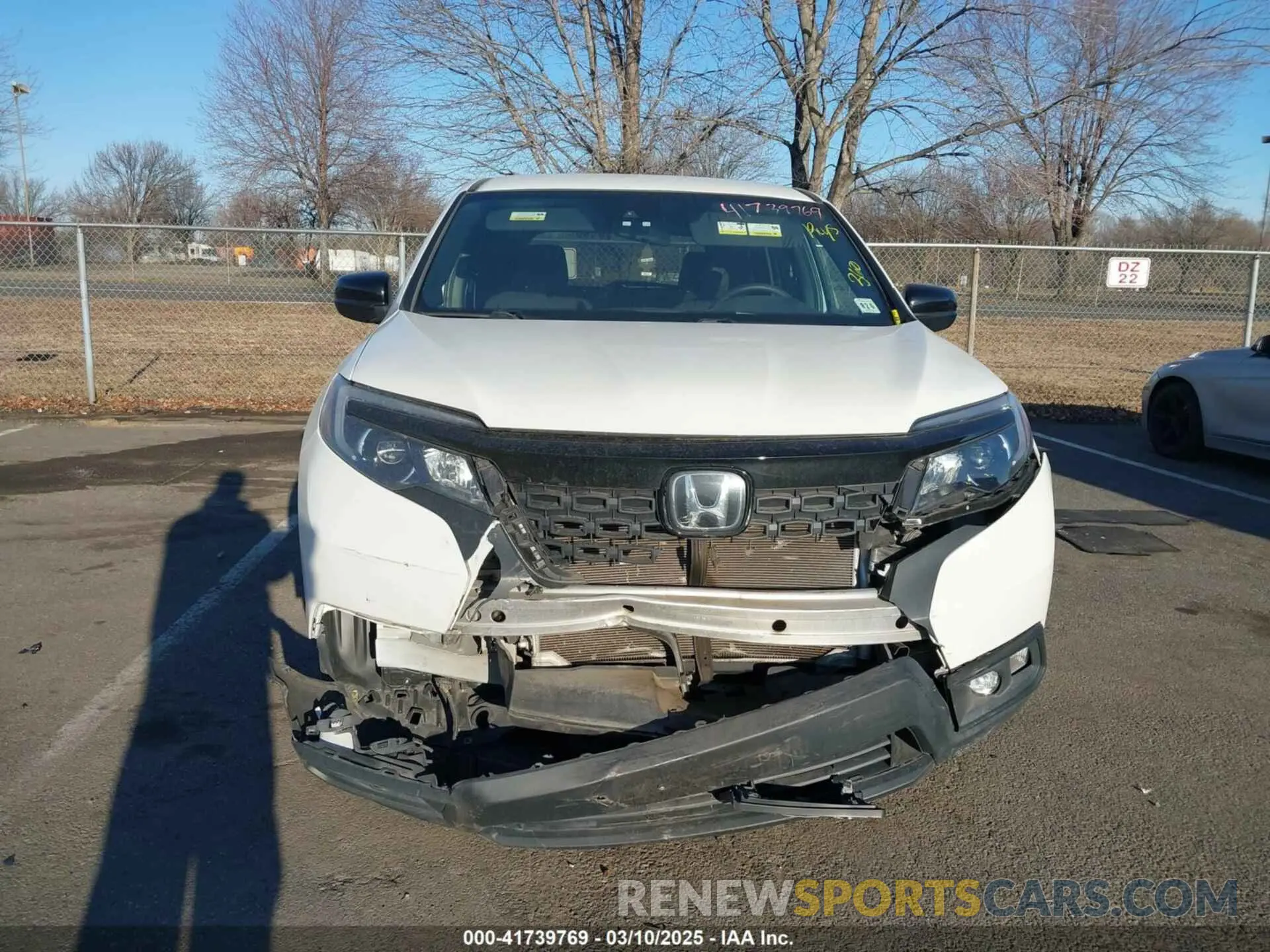 12 Photograph of a damaged car 5FNYF8H21MB031674 HONDA PASSPORT 2021