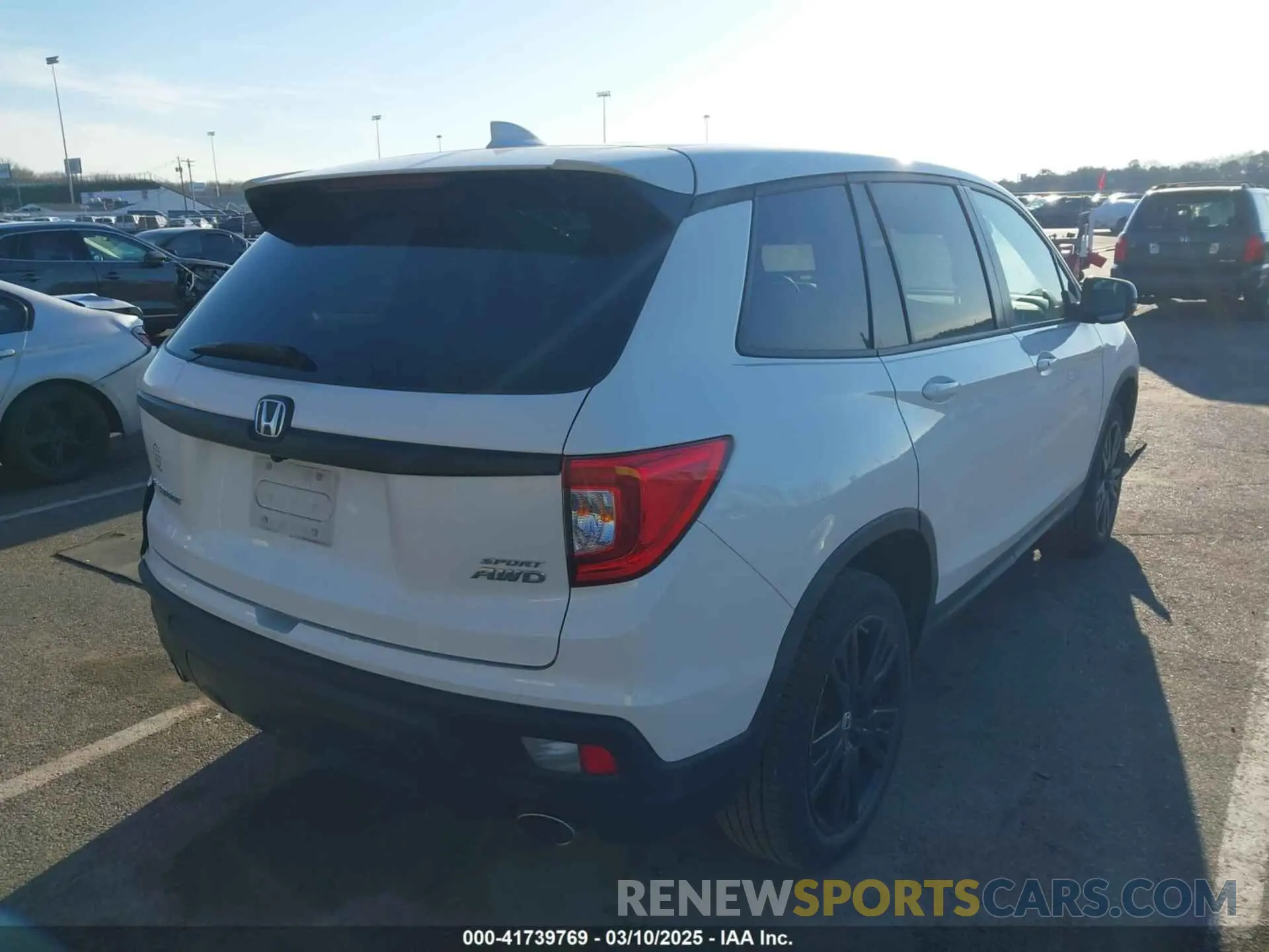 4 Photograph of a damaged car 5FNYF8H21MB031674 HONDA PASSPORT 2021