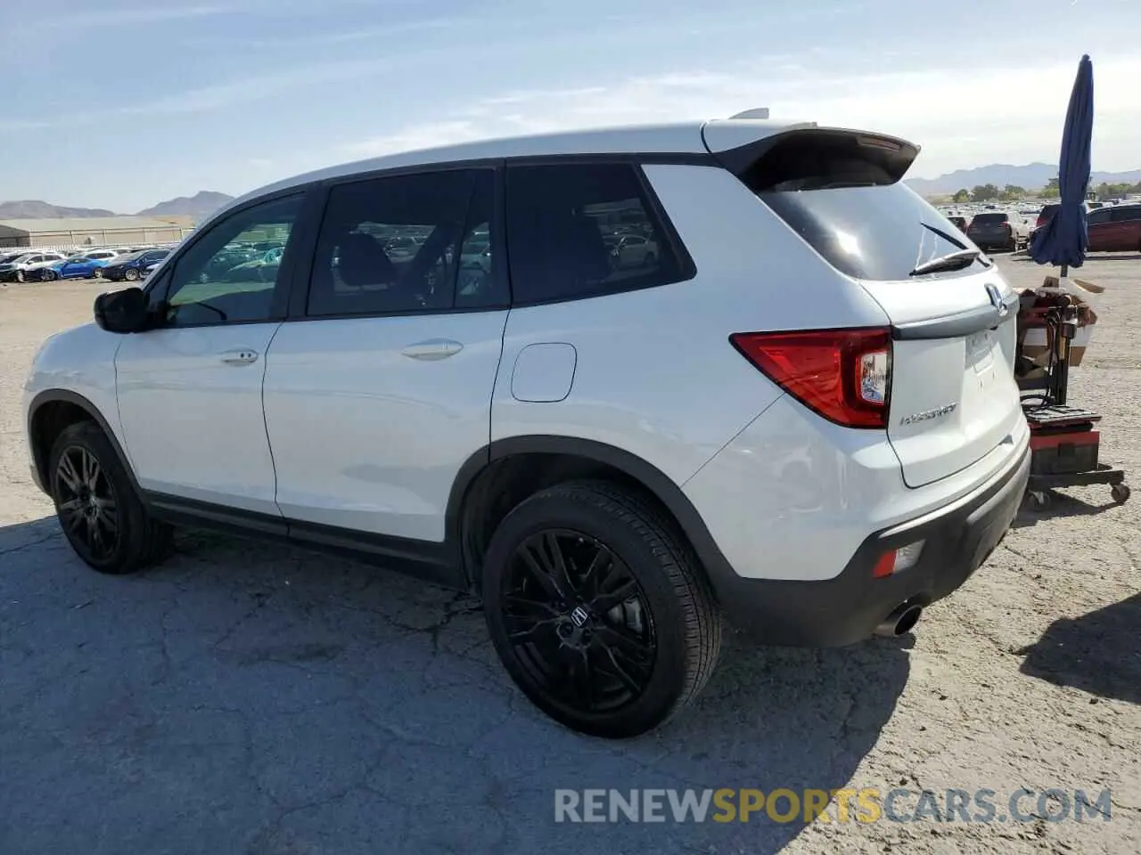 2 Photograph of a damaged car 5FNYF8H22MB030002 HONDA PASSPORT 2021