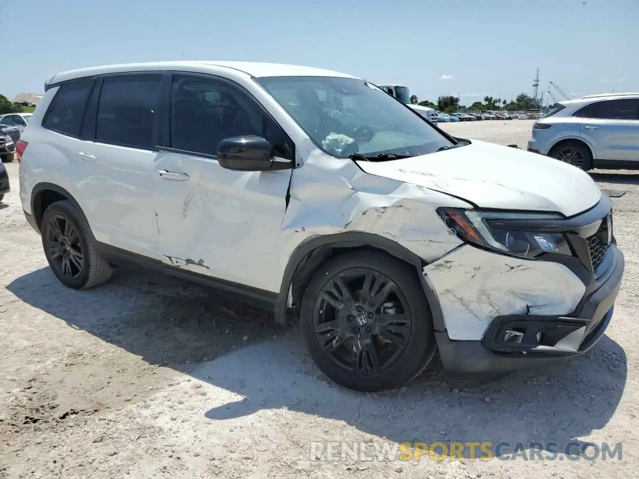 4 Photograph of a damaged car 5FNYF8H23MB013015 HONDA PASSPORT 2021
