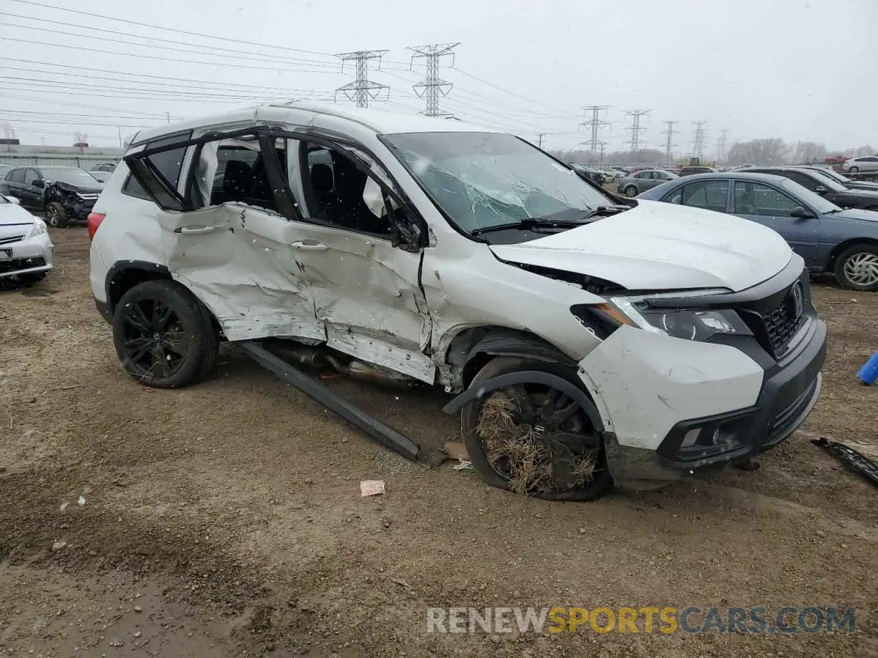 4 Photograph of a damaged car 5FNYF8H25MB014585 HONDA PASSPORT 2021