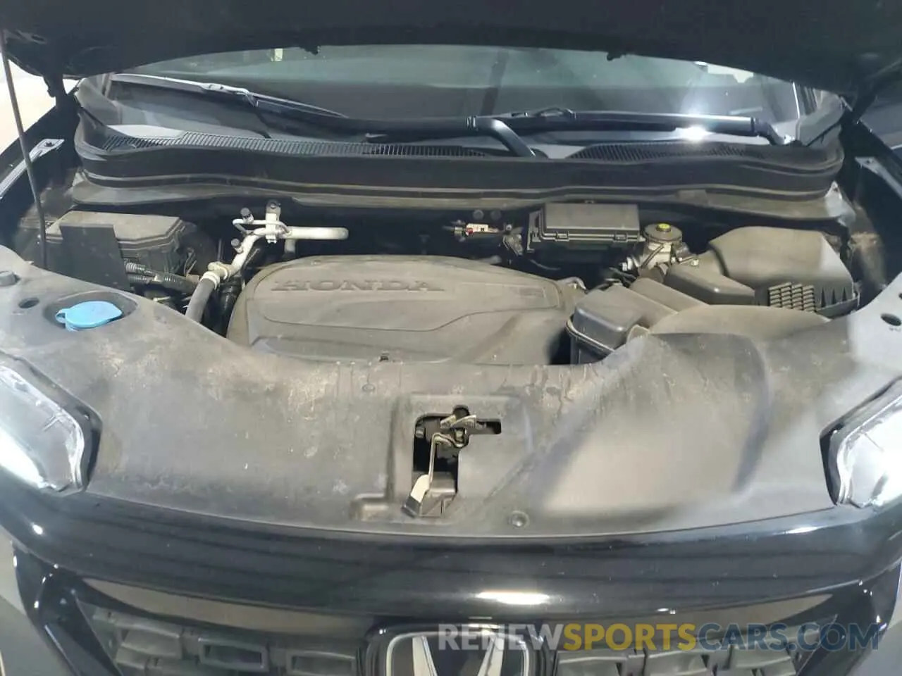 14 Photograph of a damaged car 5FNYF8H25MB033086 HONDA PASSPORT 2021