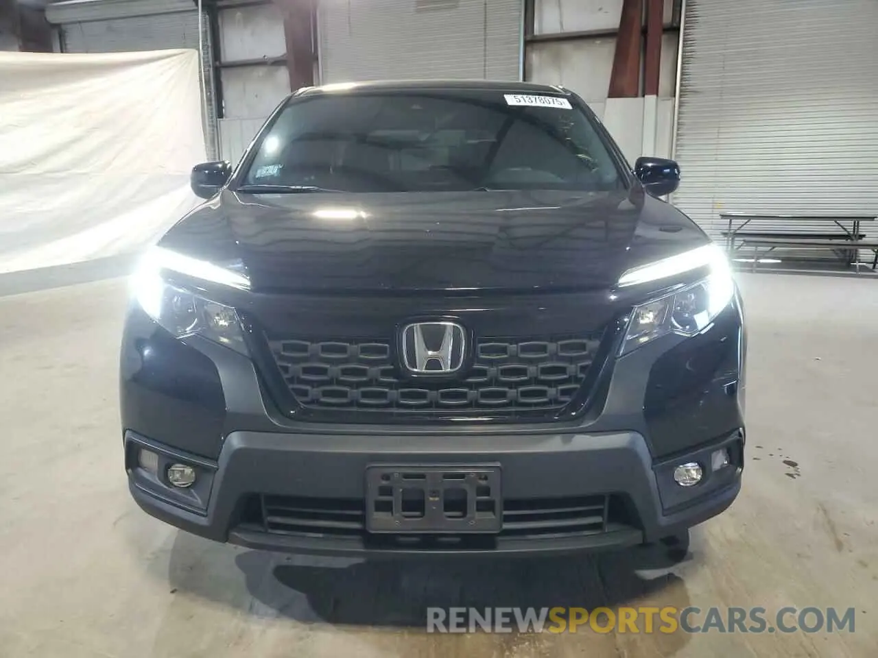 5 Photograph of a damaged car 5FNYF8H25MB033086 HONDA PASSPORT 2021