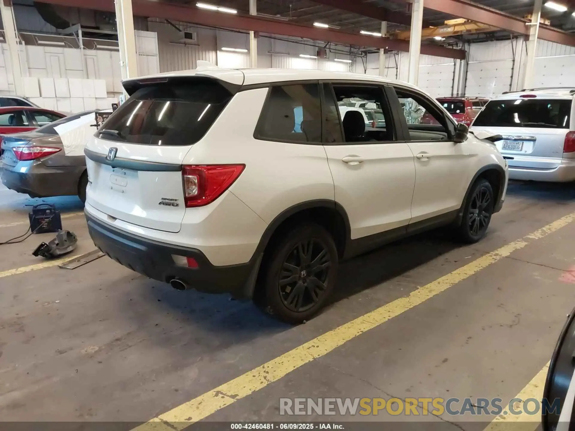 4 Photograph of a damaged car 5FNYF8H25MB037848 HONDA PASSPORT 2021