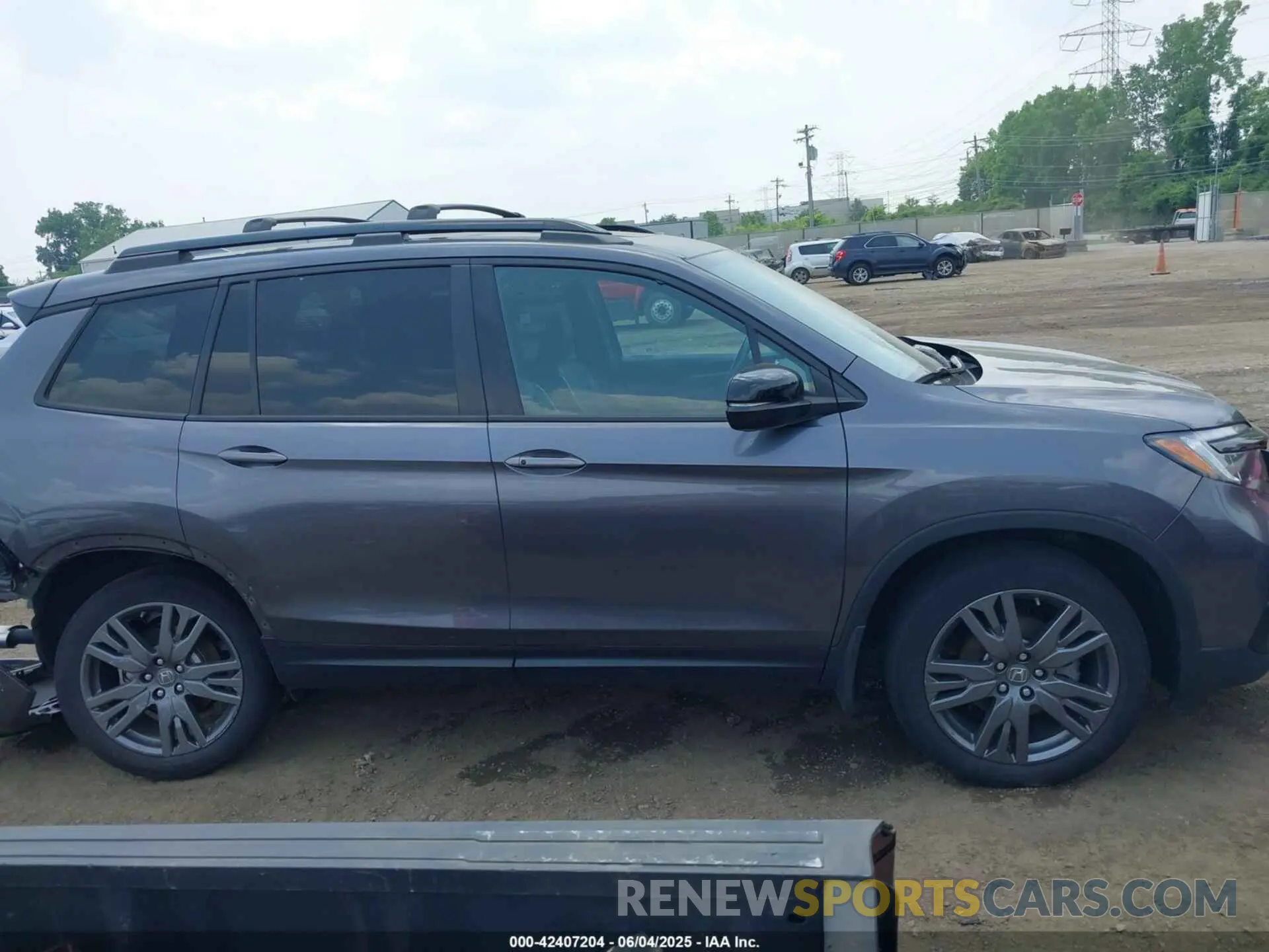 14 Photograph of a damaged car 5FNYF8H50MB013922 HONDA PASSPORT 2021