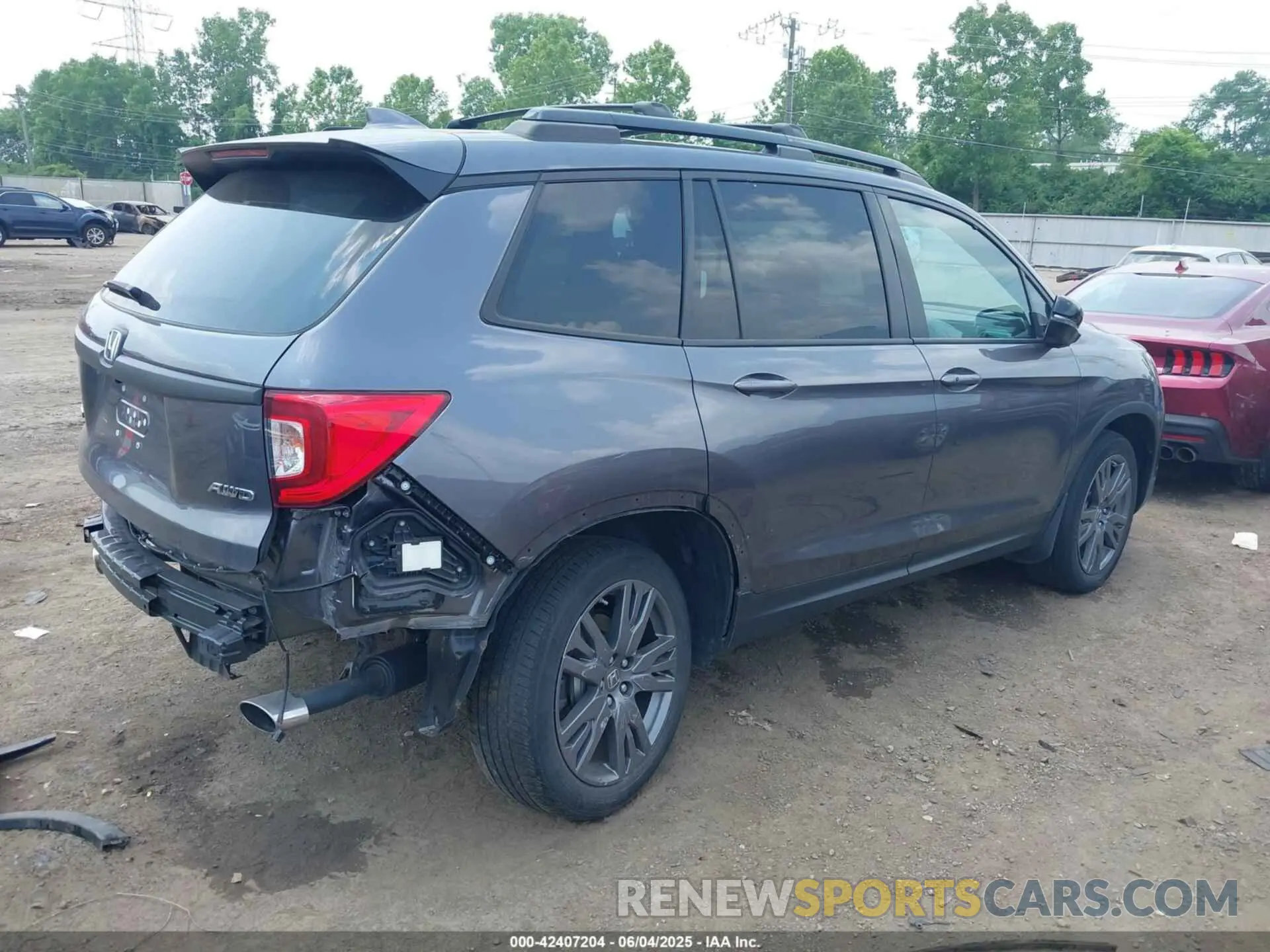 4 Photograph of a damaged car 5FNYF8H50MB013922 HONDA PASSPORT 2021
