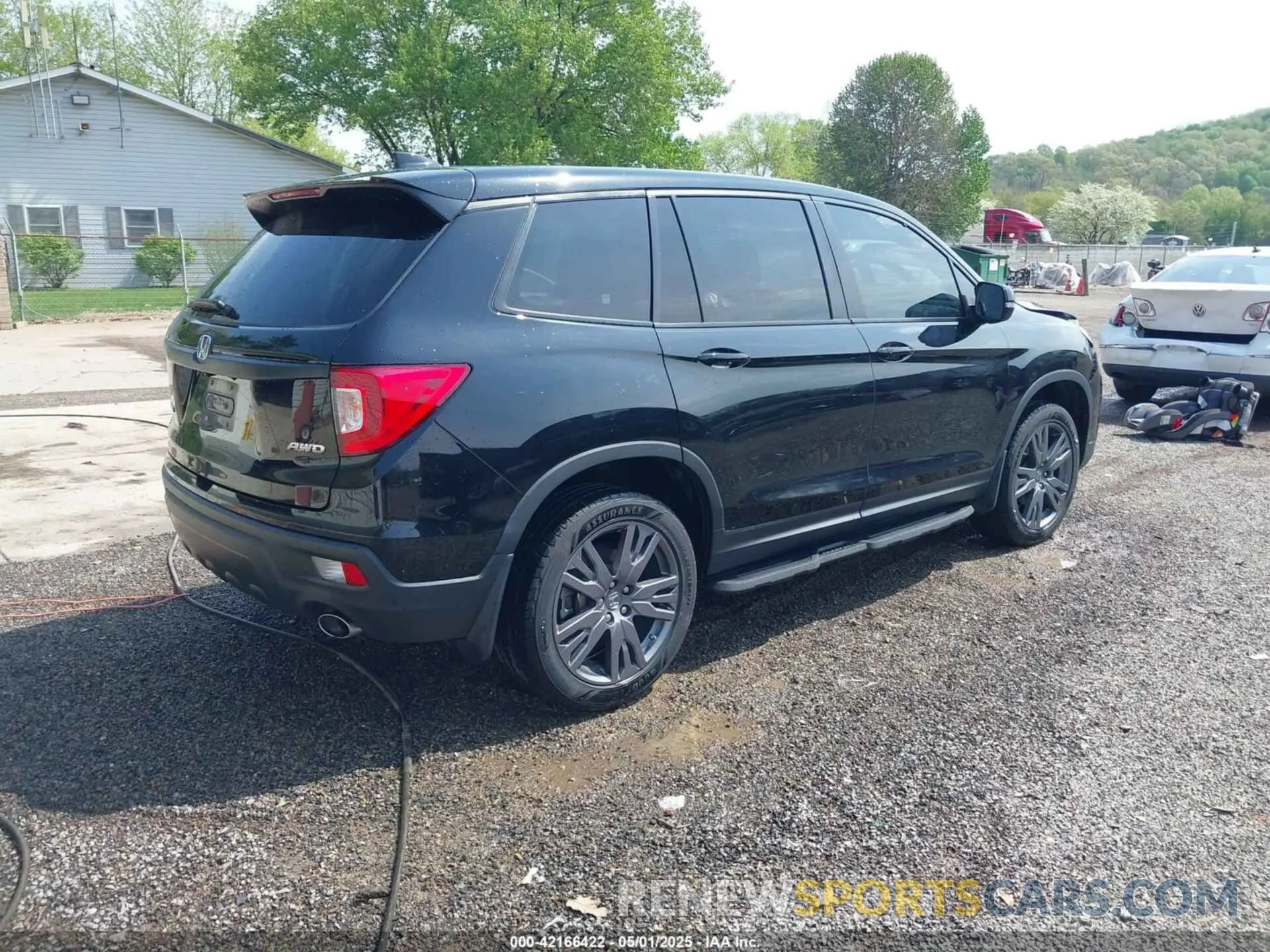 4 Photograph of a damaged car 5FNYF8H51MB026680 HONDA PASSPORT 2021