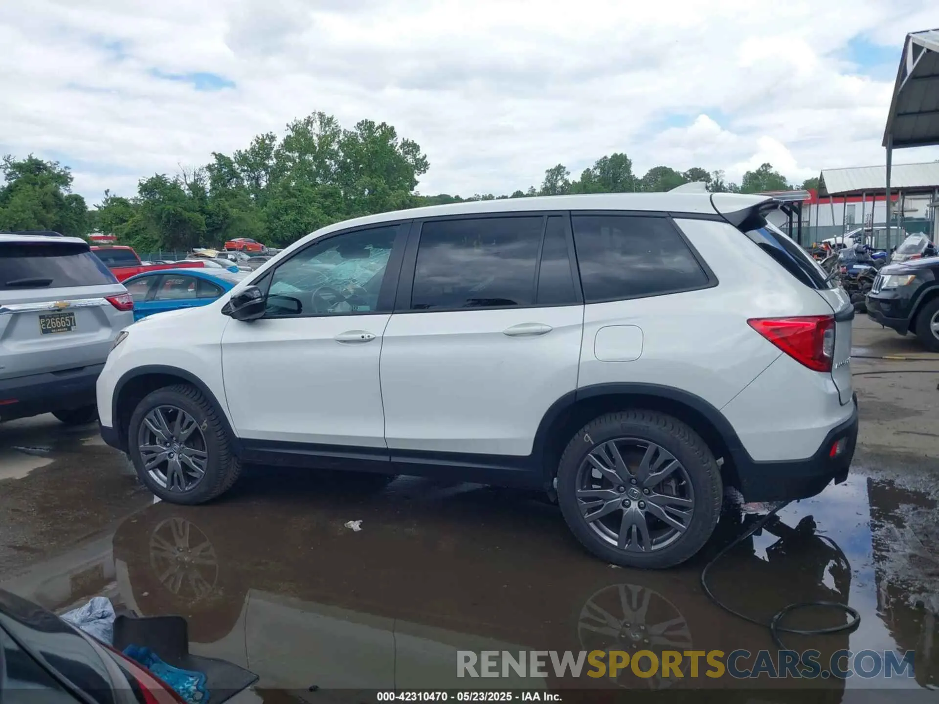 14 Photograph of a damaged car 5FNYF8H54MB041738 HONDA PASSPORT 2021