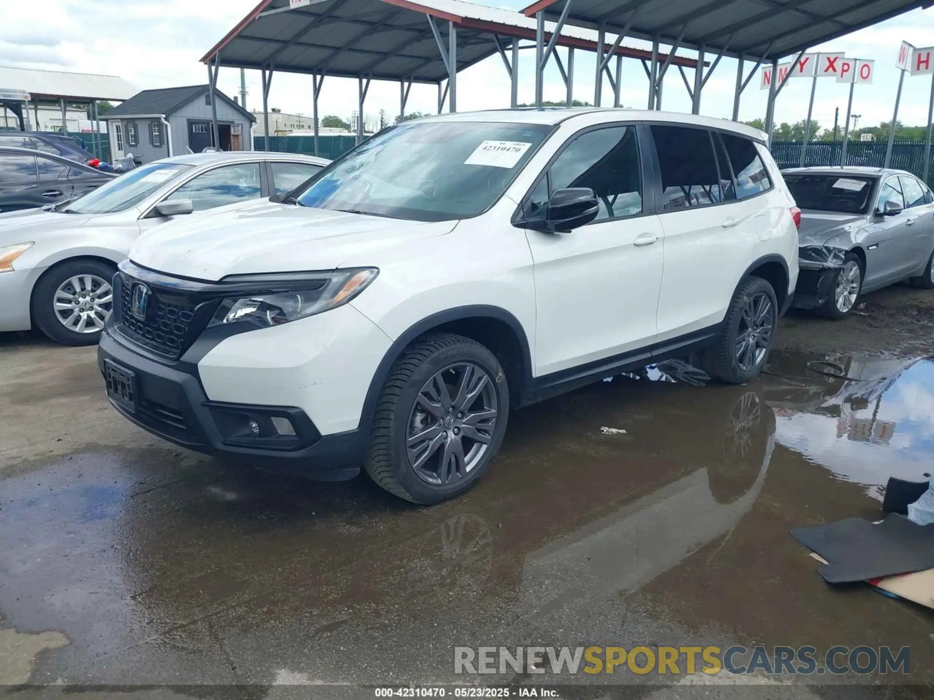 2 Photograph of a damaged car 5FNYF8H54MB041738 HONDA PASSPORT 2021