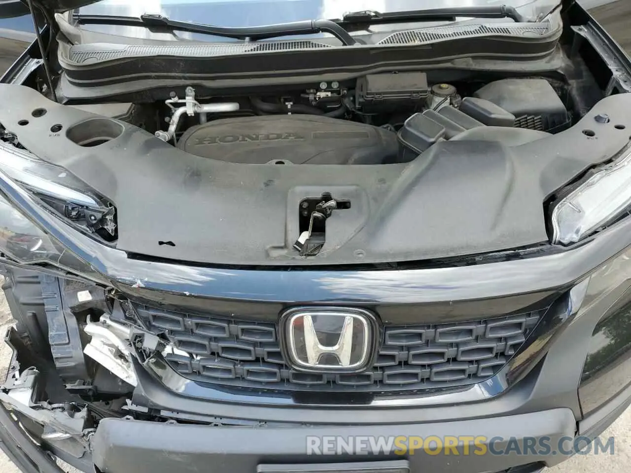 12 Photograph of a damaged car 5FNYF8H55MB011163 HONDA PASSPORT 2021