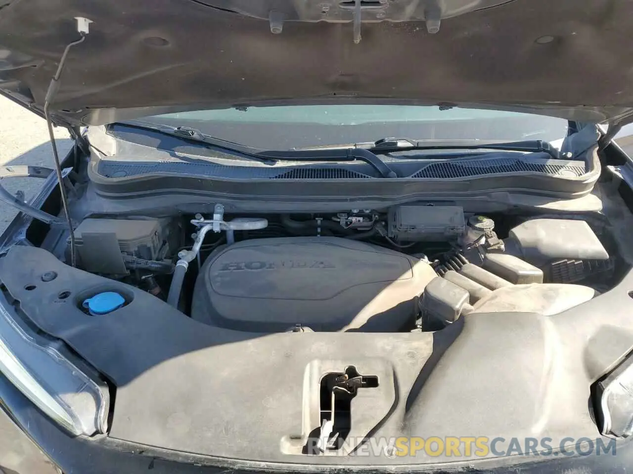 12 Photograph of a damaged car 5FNYF8H56MB032247 HONDA PASSPORT 2021
